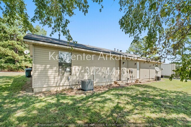 Building Photo - Cozy 2 Bedroom Duplex with Fireplace & Spacious Backyard!