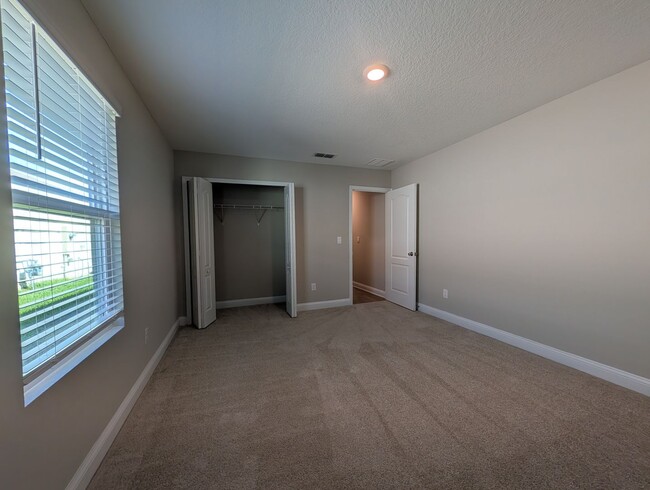 Building Photo - PREMIUM PRICE, PREMIUM FINISHES AND FULLY FENCED REAR YARD - THIS 3/2/2 IN THE DESIRABLE GATED DO...
