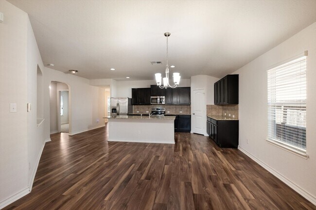 Building Photo - Stylish Home with LVP Flooring, Granite Counters & Appliances Included