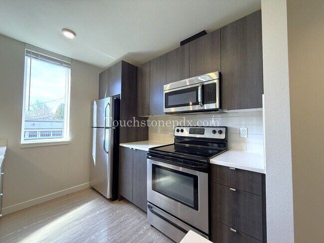 Building Photo - 2nd MONTH RENT FREE! Modern 2 Bedroom, 1.5 Bathroom Apartment