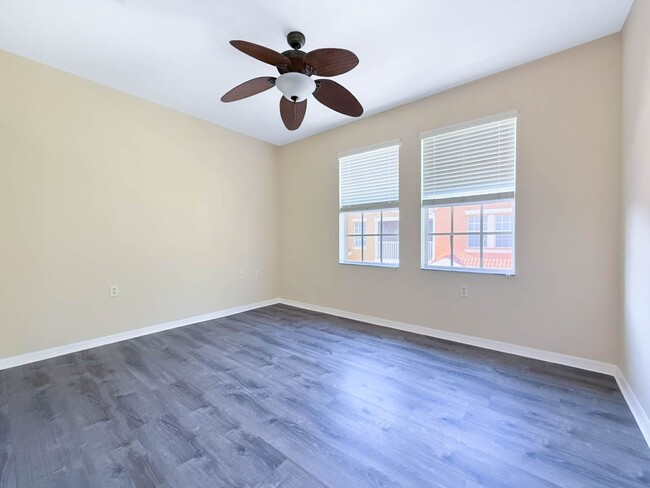 Building Photo - Beautiful 3-Bedroom Condo with 2-Car Garag...