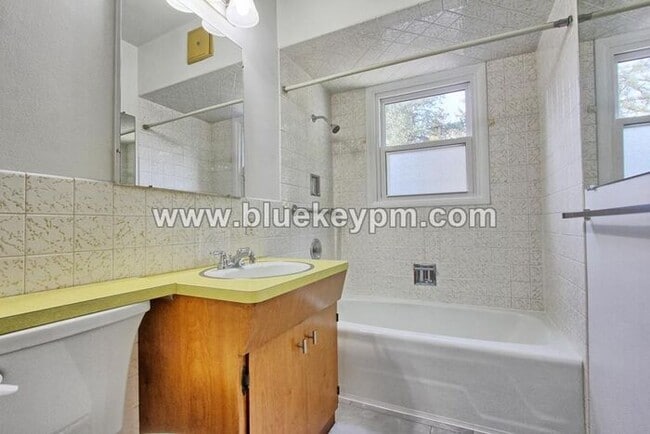 Building Photo - 4 Bedroom, 2 Bath Home with Primary on Main Floor, Basement and Large Fenced Yard