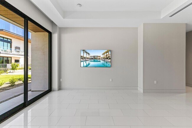 Building Photo - 6587 N Palmeraie Blvd