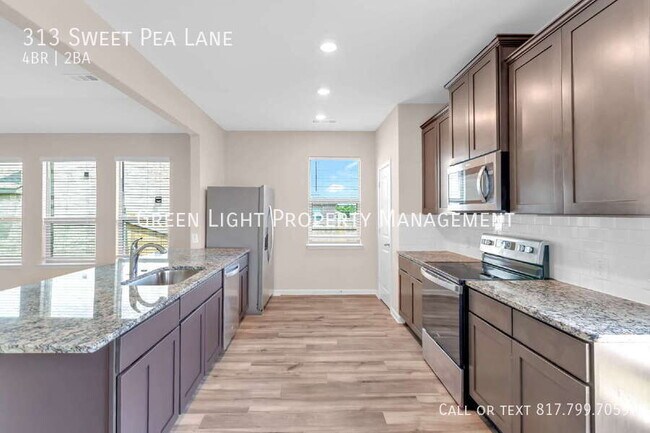 Building Photo - 313 Sweet Pea Ln