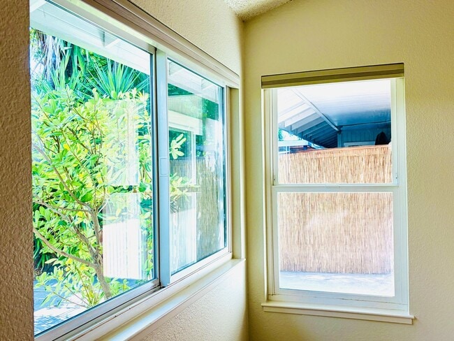 Building Photo - House like 2bed/1.5 Bath Condo with Spacious Corner Yard and 2 Car Garage