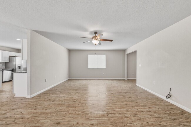 Building Photo - Gated Community Home with Solar Panels & All Appliances Included