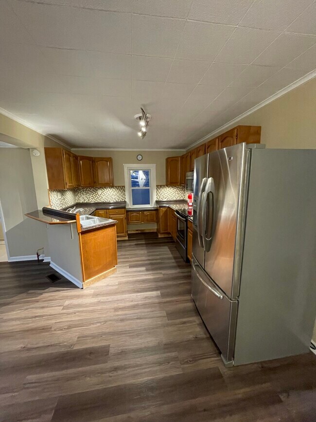 kitchen with fridge, oven, microwave, and dishwasher - 2310 Old Berwick Rd