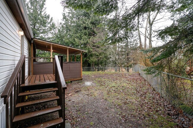 Building Photo - 3 Bedroom 1.75 Bath Mobile Home with Garag...