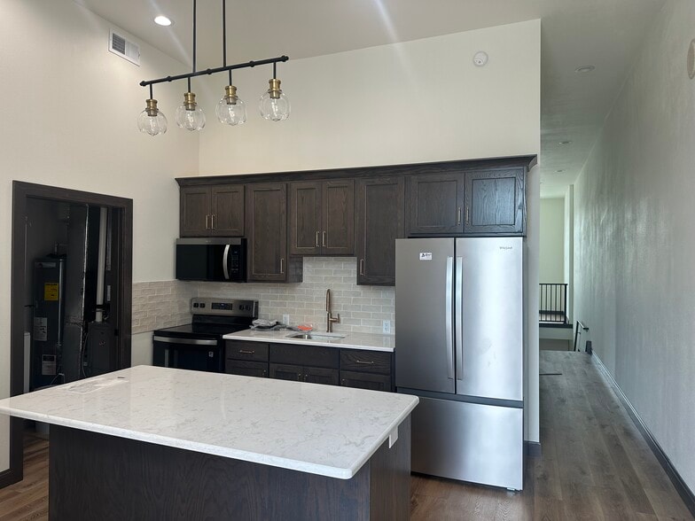Kitchen with new appliances - 210 S Main St