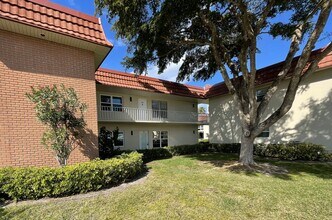 Front door and window view from parking - 10 Vista Palm Ln