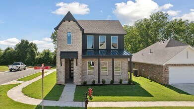 Building Photo - Welcome to this stunning new build in the desirable gated community of Broken Arrow, OK!