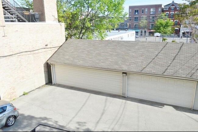 1 garage parking spot included in rent - 2117 W Rice St