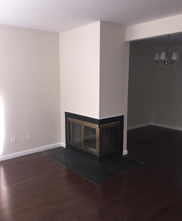 Fireplace in living room/dining room - 900 South Paca Street