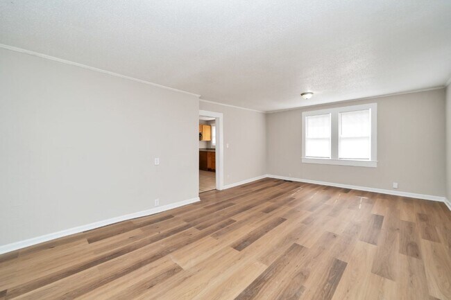Building Photo - Charming & Fully Renovated Home – Act Fast!