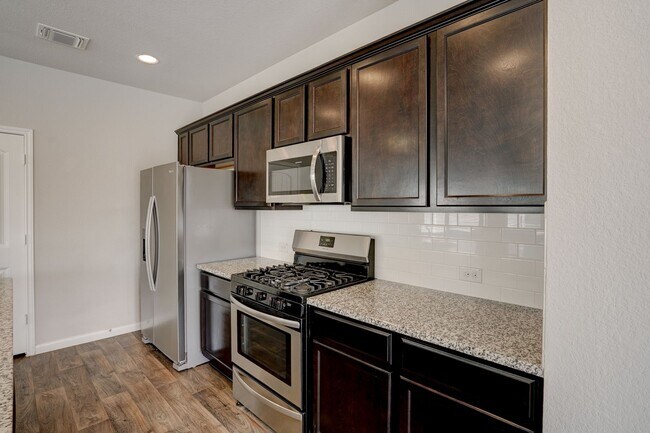 Building Photo - Charming 4/BR 2/BA One-Level Home with Spa...