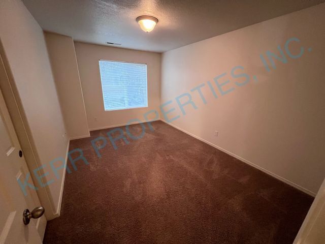 Building Photo - 4 Bd / 2.5 Bth - Central A/C - Attached Ga...