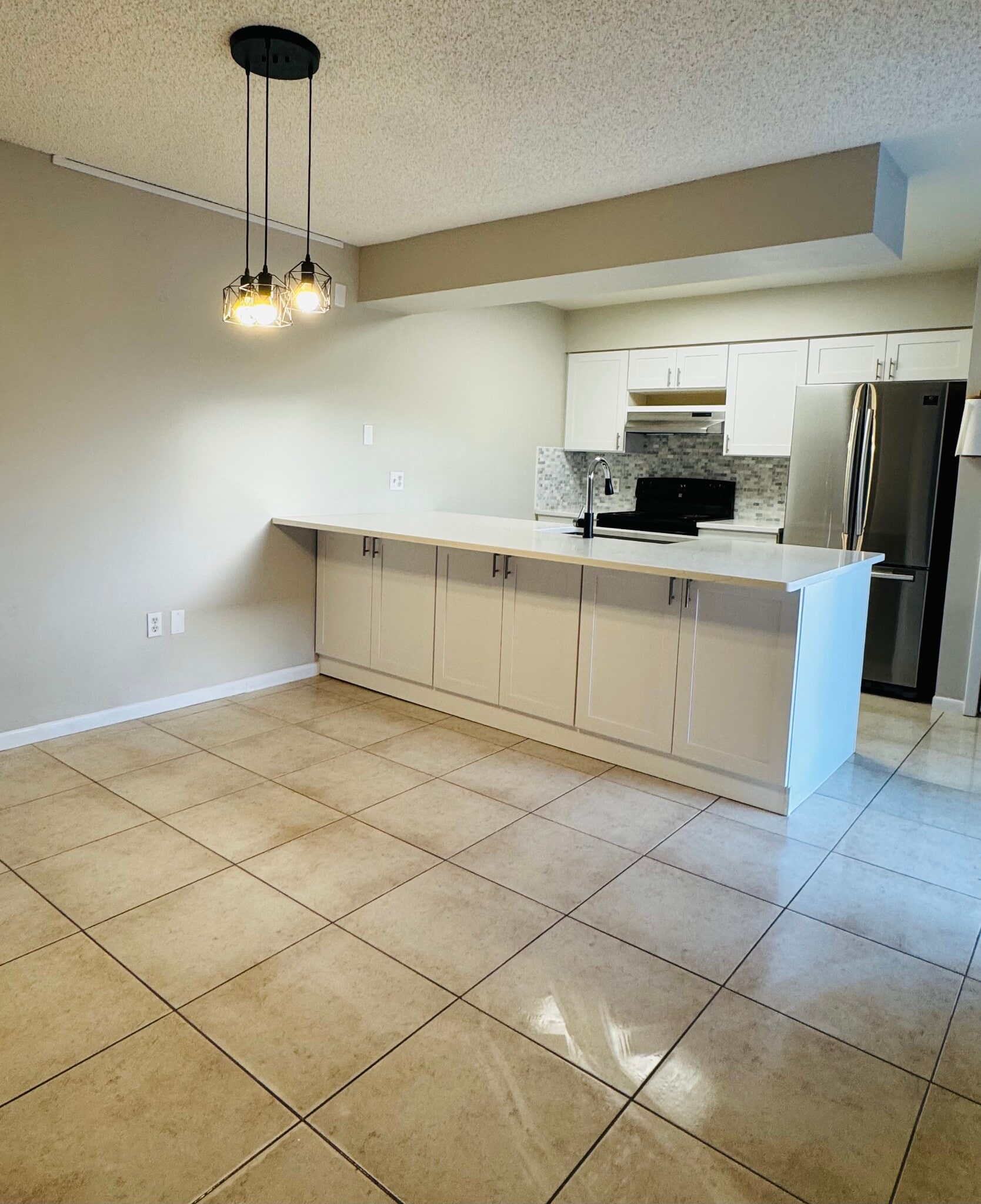 Dining Room & Newly Renovated Kitchen - 200 S Banana River Blvd