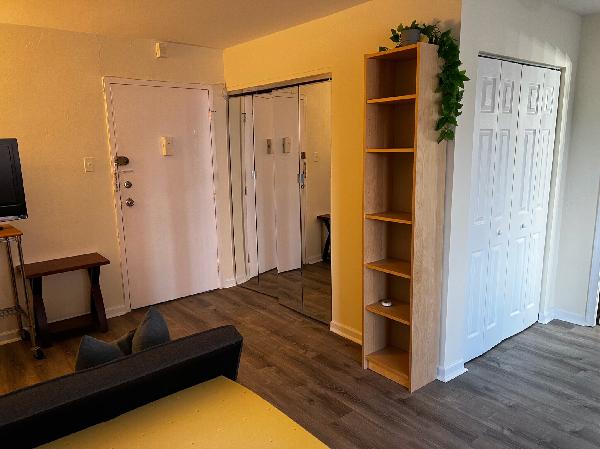 Small mirrored entry closet on left - 1420 N St NW