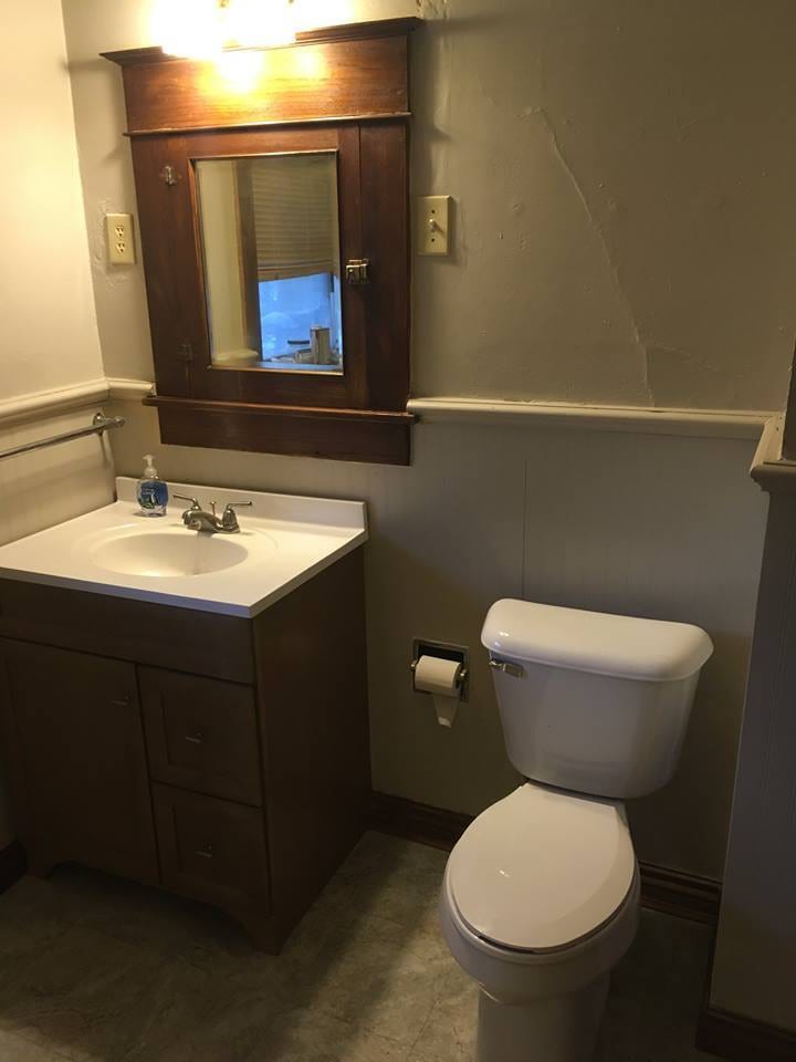 Updated 2nd floor bathroom, new toilet, vanity and shower surround - 1545 S 13th St
