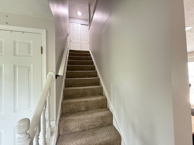 Stairs to Second floor bedrooms - 7468 Graystone Ct