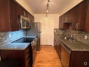 Building Photo - Charming 1-Bedroom Furnished Condo in Seat...