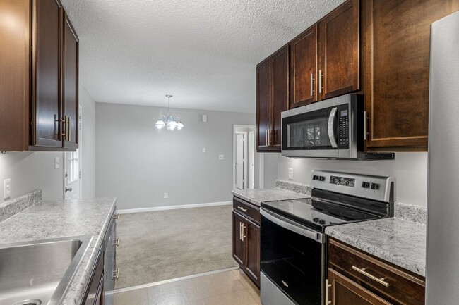 Building Photo - SW - Like New Home! Newer SS Appliances & Cabinets, Ceiling Fans, Blinds, Front Porch and Deck. M...