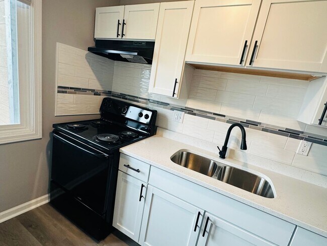 Building Photo - Experience Luxury Living at Park Harrison:...