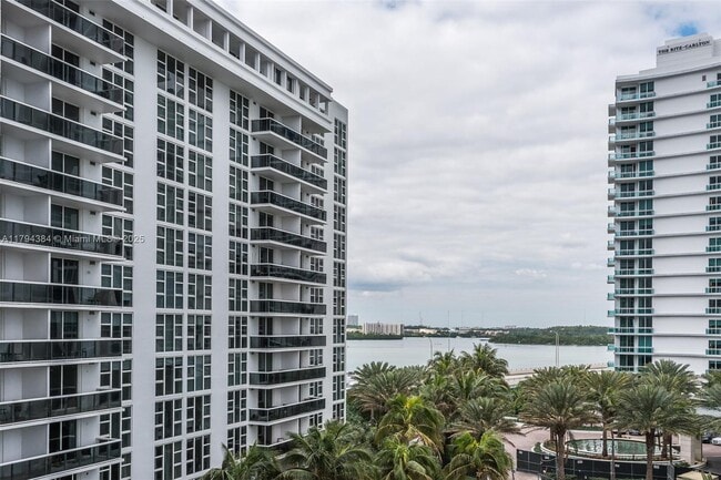 Building Photo - 10275 Collins Ave