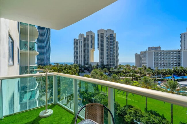 Building Photo - 19370 Collins Ave