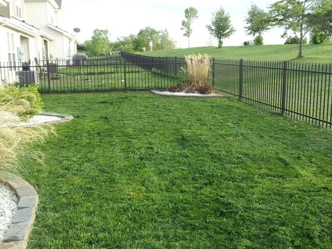 Building Photo - CLOSE TO FT. RILEY, FENCED BACKYARD!