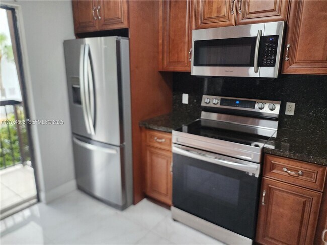 Building Photo - 5350 W 21st Ct