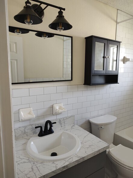 Completely renovated bathroom - 5931 13th St