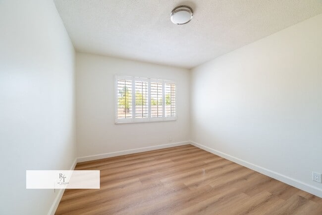 Building Photo - Remodeled House with Spacious Flat Lot - L...