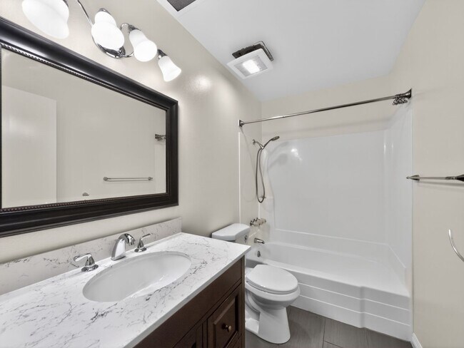 Building Photo - Remodeled, Single-Level, End-Unit Condo in Irvine