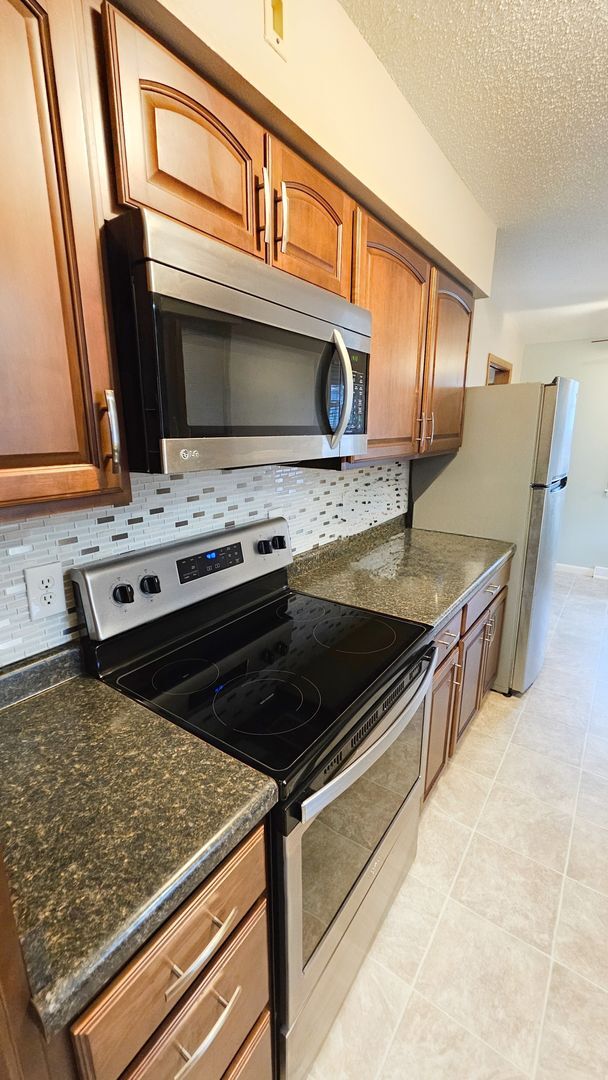 Building Photo - Charming & Updated 3-Bedroom Home with Sunroom, Fireplace & Garage