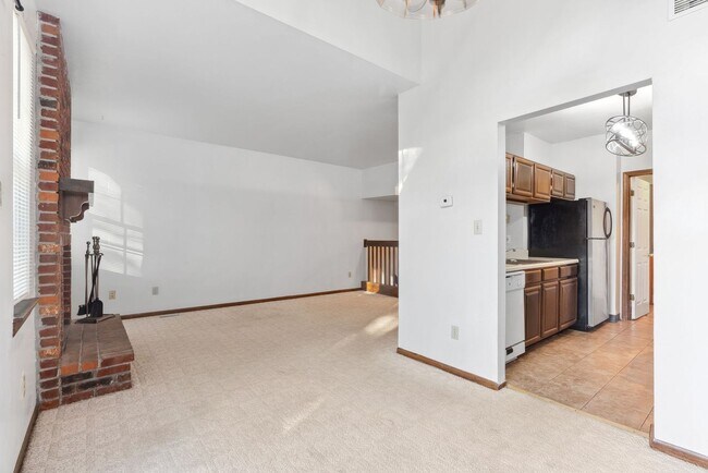 Building Photo - COMING SOON - Spacious 2-Bed, 3.5-Bath Townhouse with Stunning Lake Views