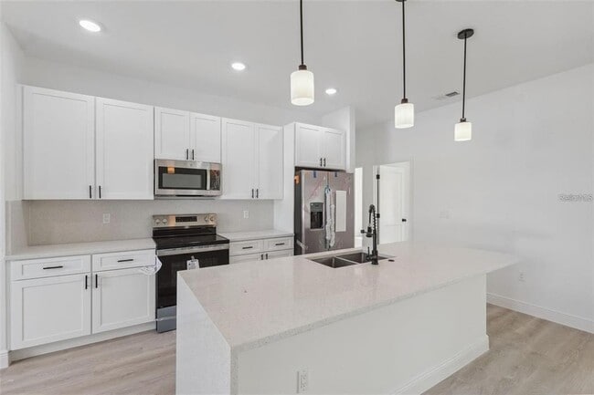 Building Photo - 6175 SW 144th Street Rd