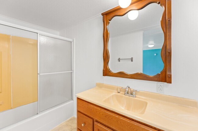 Building Photo - Updated mobile home on acre lot with garag...