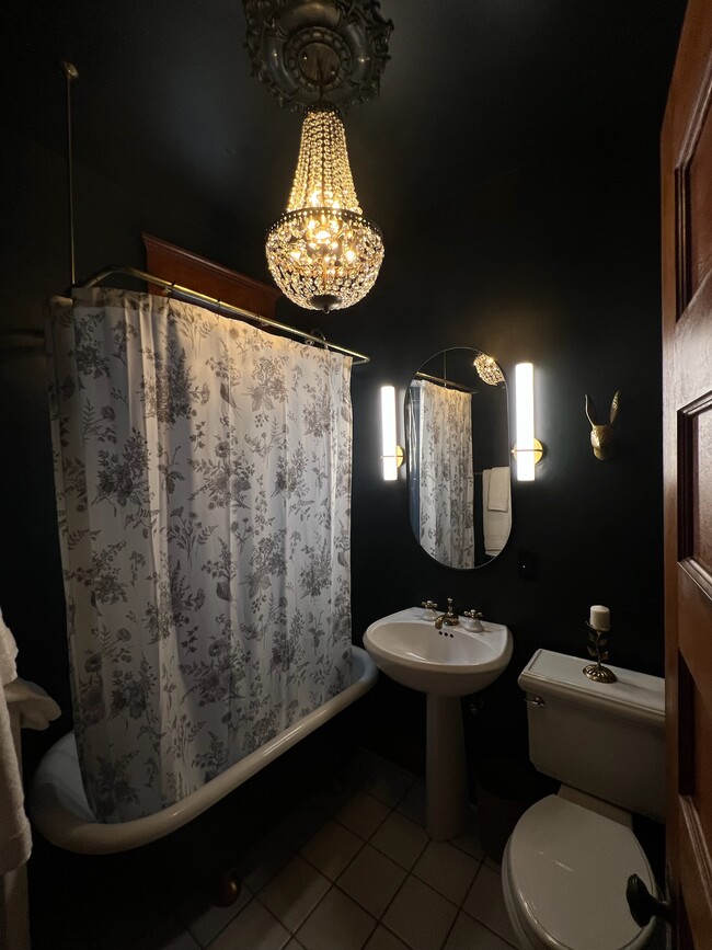 All the lighting is dimmable for the perfect cozy bath or shower. - 2424 Stevens Ave