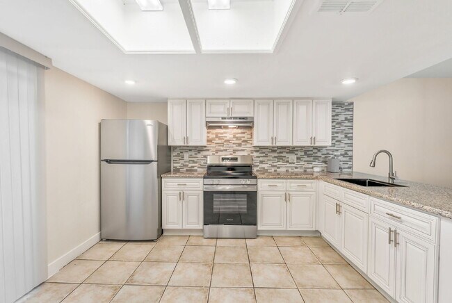 Building Photo - FULLY REMODELED UPSTAIRS CONDO | 3 BEDROOM | GRANITE COUNTERS | LAKE MEAD & JONES