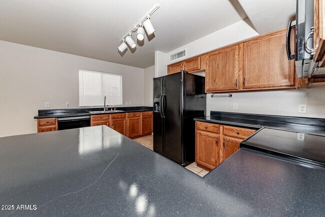 Building Photo - 1506 S 122nd Ln