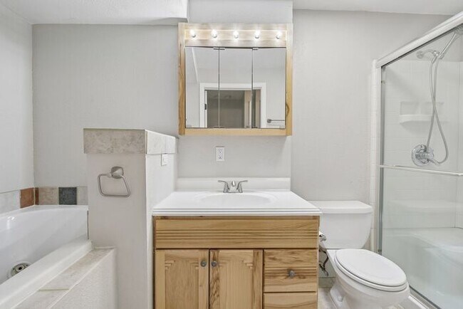 Building Photo - Townhome-Style Living with Greenbelt Views, Attached Garage & Community Pool!