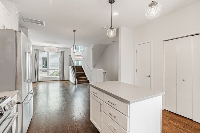 Building Photo - Modern 2BD, 3BA RiNo Townhome with Garage and Rooftop Deck