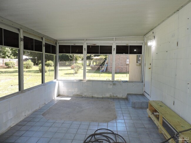 Building Photo - 6970 Woodley Dr