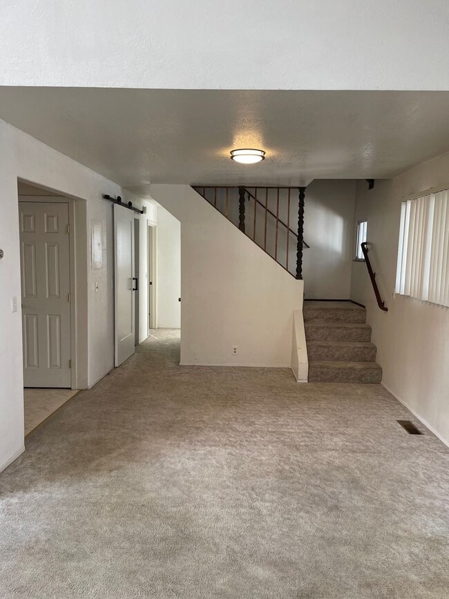 Building Photo - Al Tahoe - 4 bedroom 2 bath with garage av...
