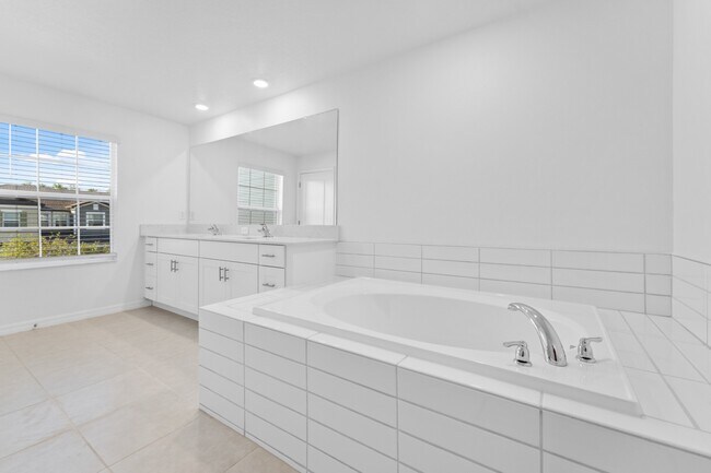 Building Photo - Absolutely stunning 3 BR /2.5 Bath / 2 Car Garage + LOFT townhome in ultra-modern and green-focus...