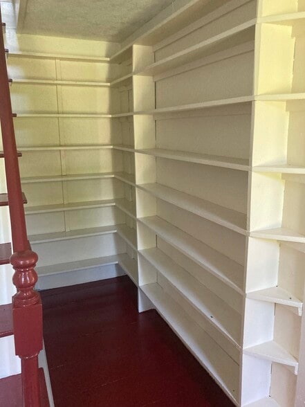 Shelves next to stairs - 176 Bagley Hill Rd