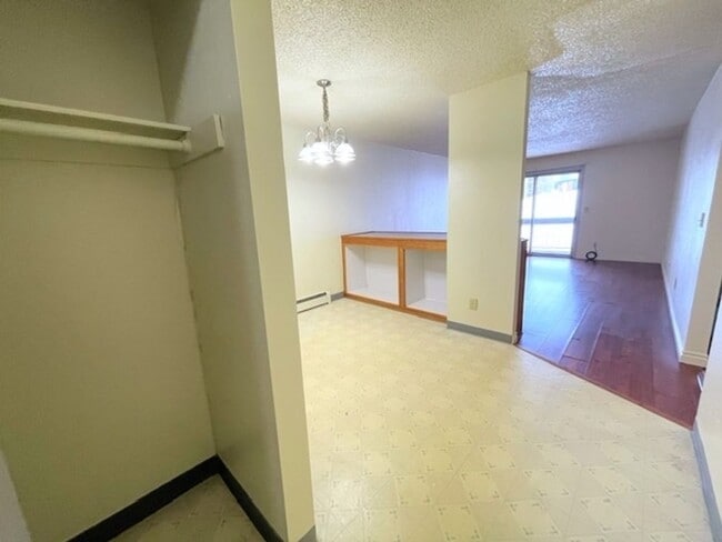 Building Photo - East Anchorage Condo with Laminate Floorin...