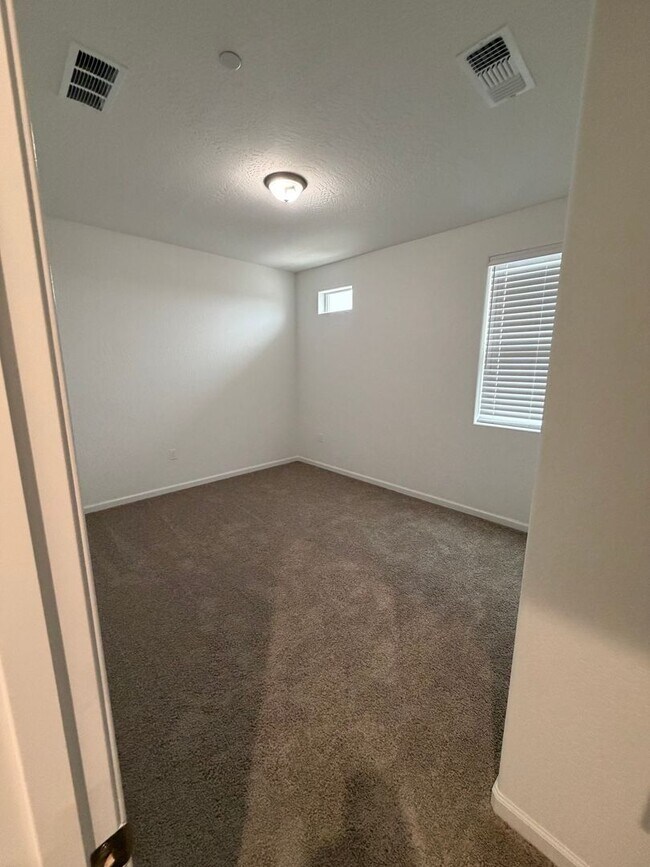 Building Photo - Spacious Brand New 4-Bedroom, 3-Bathroom Home with Solar & Low-Maintenance Yard