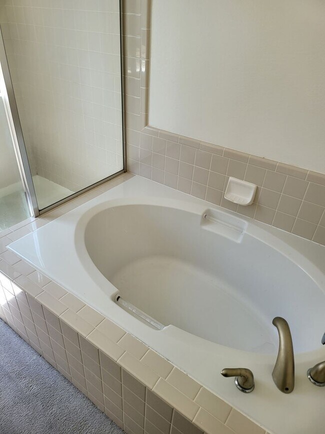 Building Photo - Three Bedroom and Three bathroom home and ...